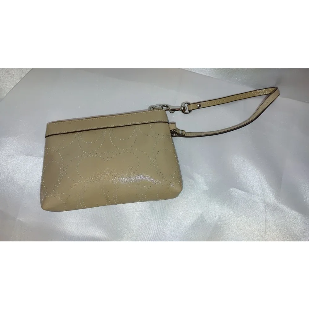 Coach Perforated Signature C Patent Leather Sand Colored Wristlet